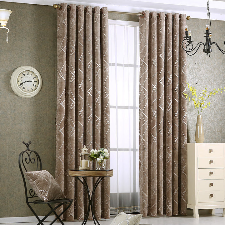 Grey chenille blackout curtain at window