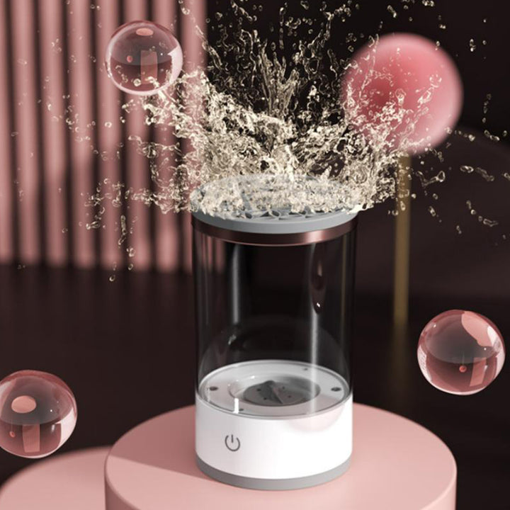 Electric makeup brush cleaner spinning a brush