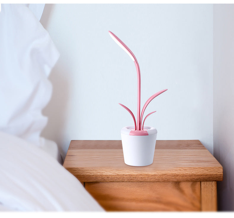 Pink plant shaped desk lamp