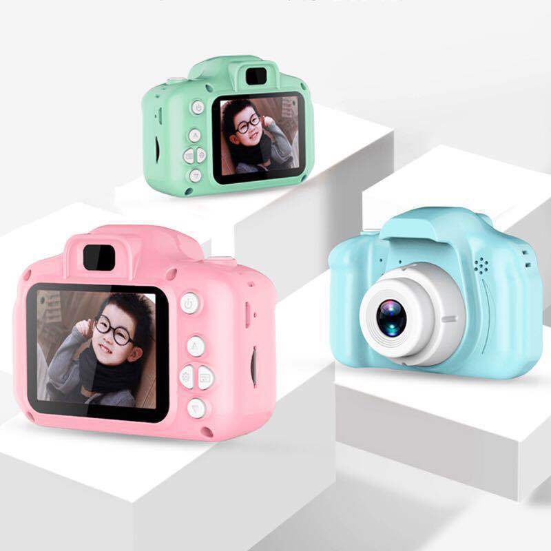 Small kids camera with screen in hand