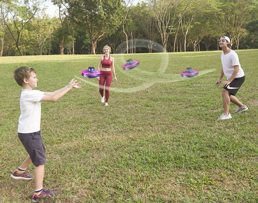 Light-up spinner ball flying back to a hand