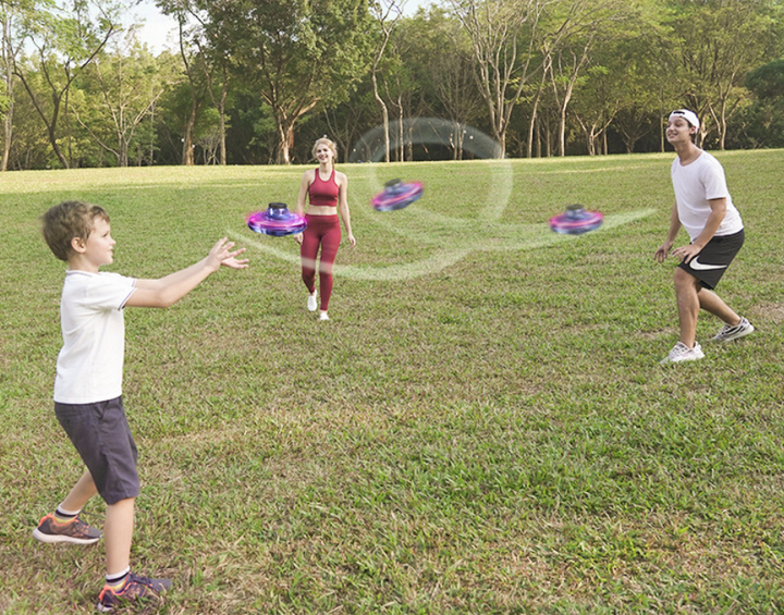 Light-up spinner ball flying back to a hand