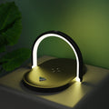 White foldable lamp charging a phone