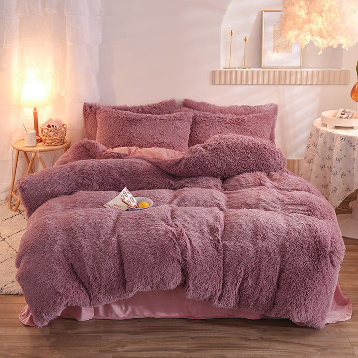 Fluffy plush bedding set on a double bed