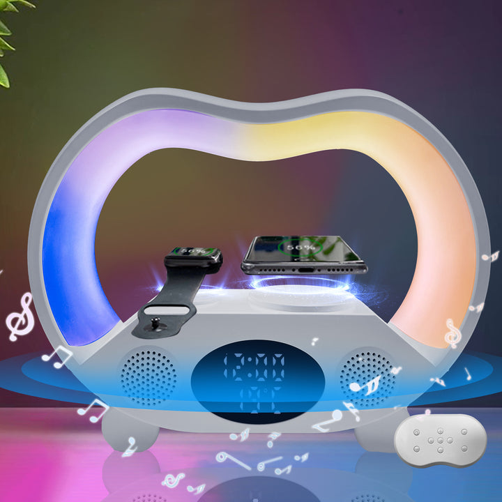 Lamp with speaker charging phone at bedside