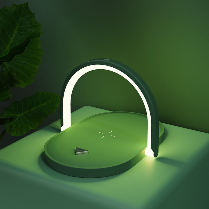 White foldable lamp charging a phone