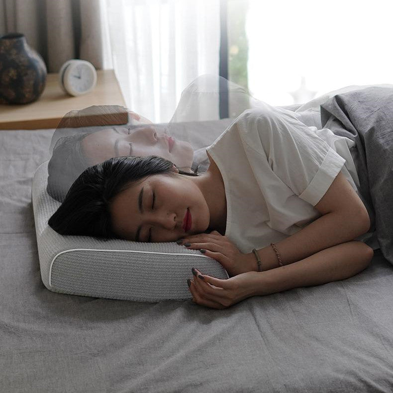 Grey memory foam pillow with knitted cover