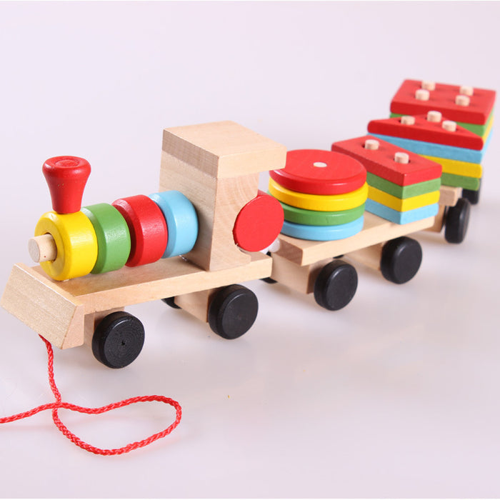Havenholt Wooden pull-along train with 16 shape blocks