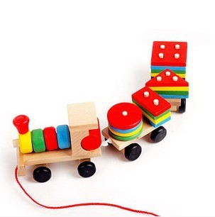 Wooden pull-along train with shape blocks