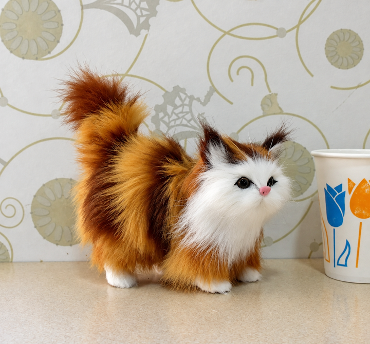 Black and White Plush Cat with Lifelike Features