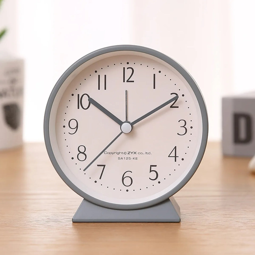 Compact Analog Alarm Clock with Silent Second Hand and Yellow Night Light