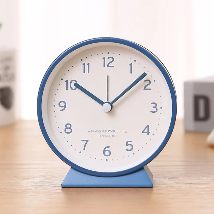 Compact Analog Alarm Clock with Silent Second Hand and Yellow Night Light