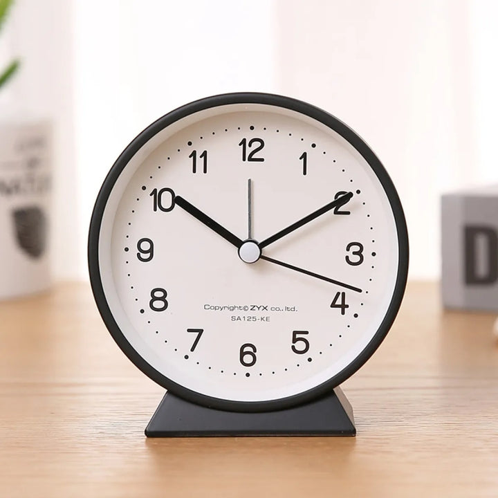 Compact Analog Alarm Clock with Silent Second Hand and Yellow Night Light