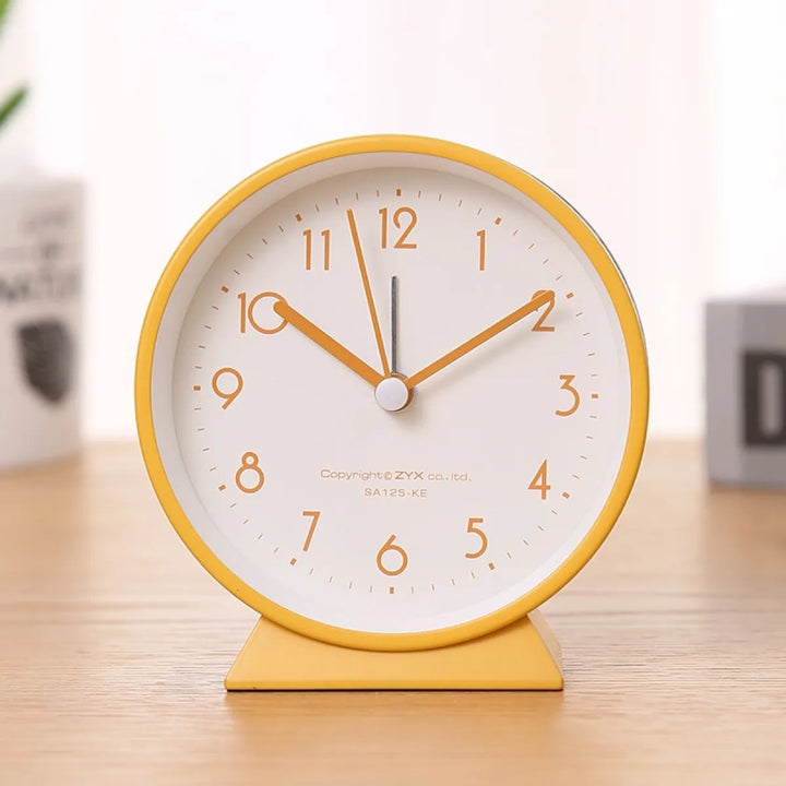 Compact Analog Alarm Clock with Silent Second Hand and Yellow Night Light