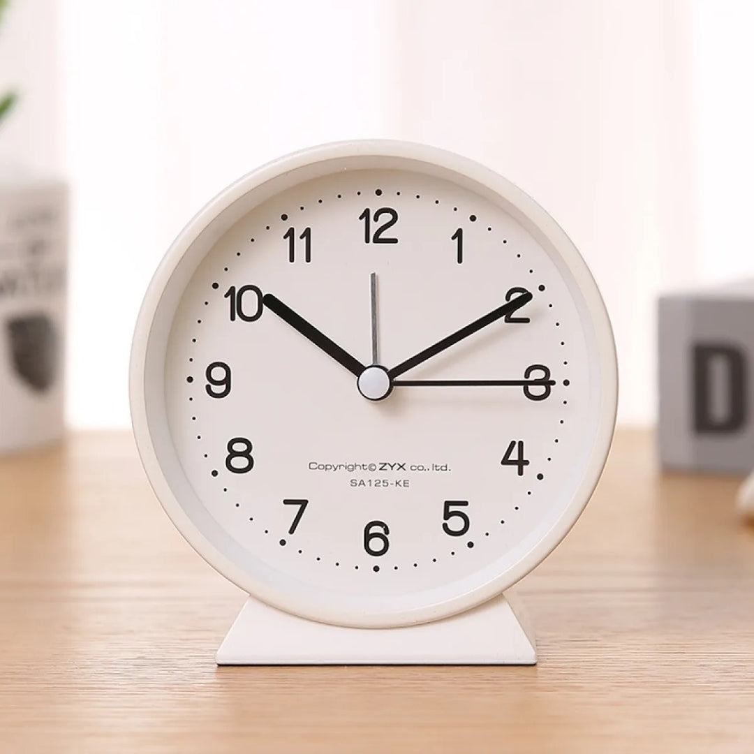 Compact Analog Alarm Clock with Silent Second Hand and Yellow Night Light