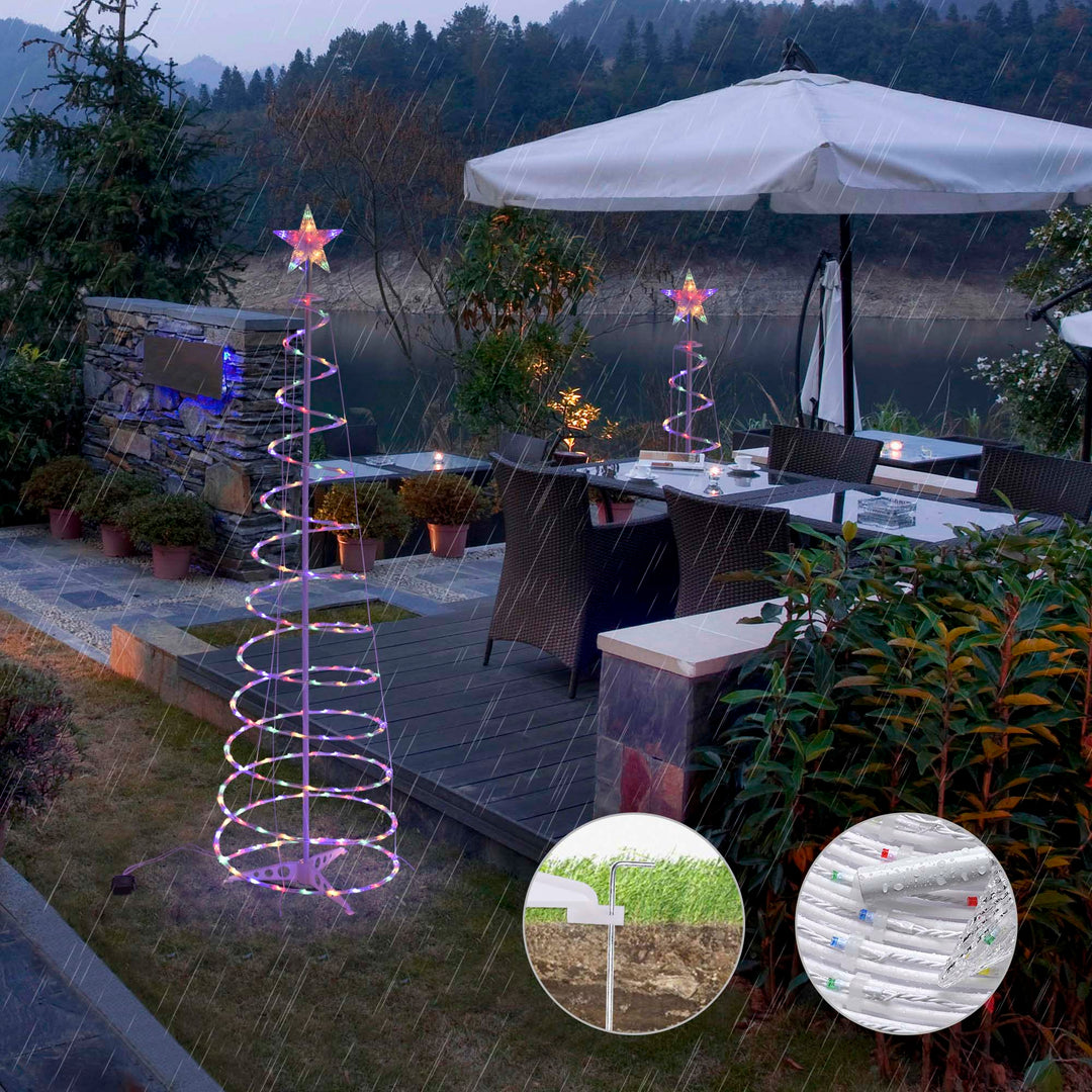 Glowing spiral Christmas tree light outdoors