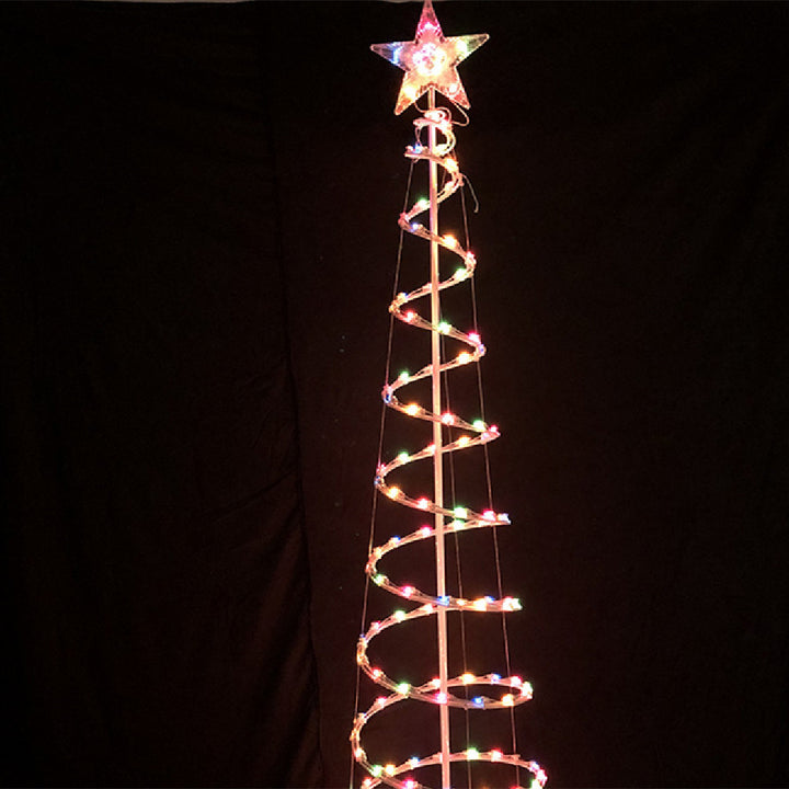 Glowing spiral Christmas tree light outdoors